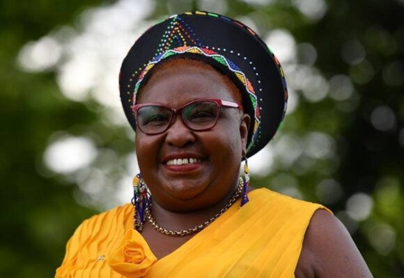 woman in a yellow top