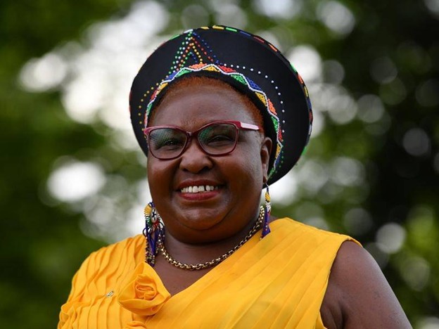 woman in a yellow top