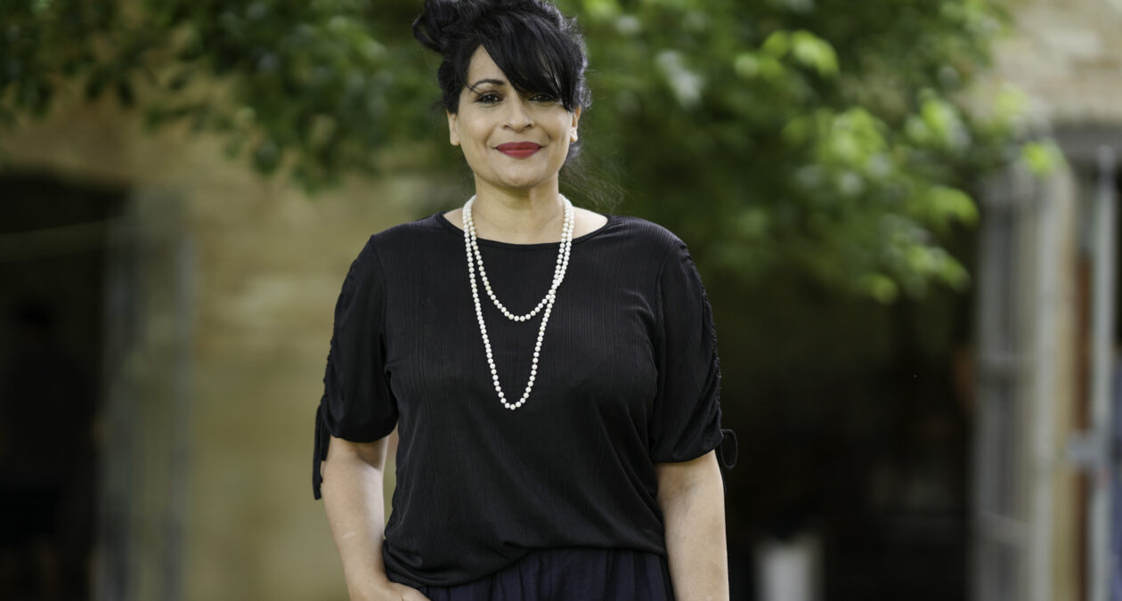woman standing outside looking at camera