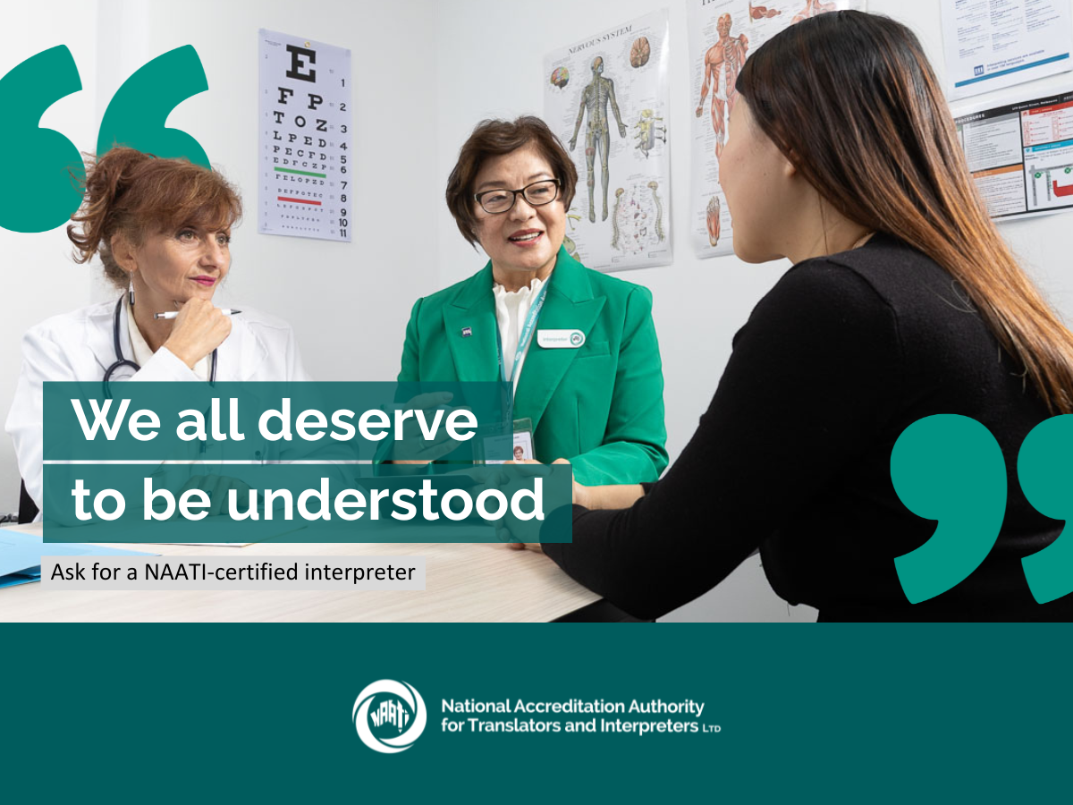 Three people in a medical room with one person formally interpreting between the two other people.